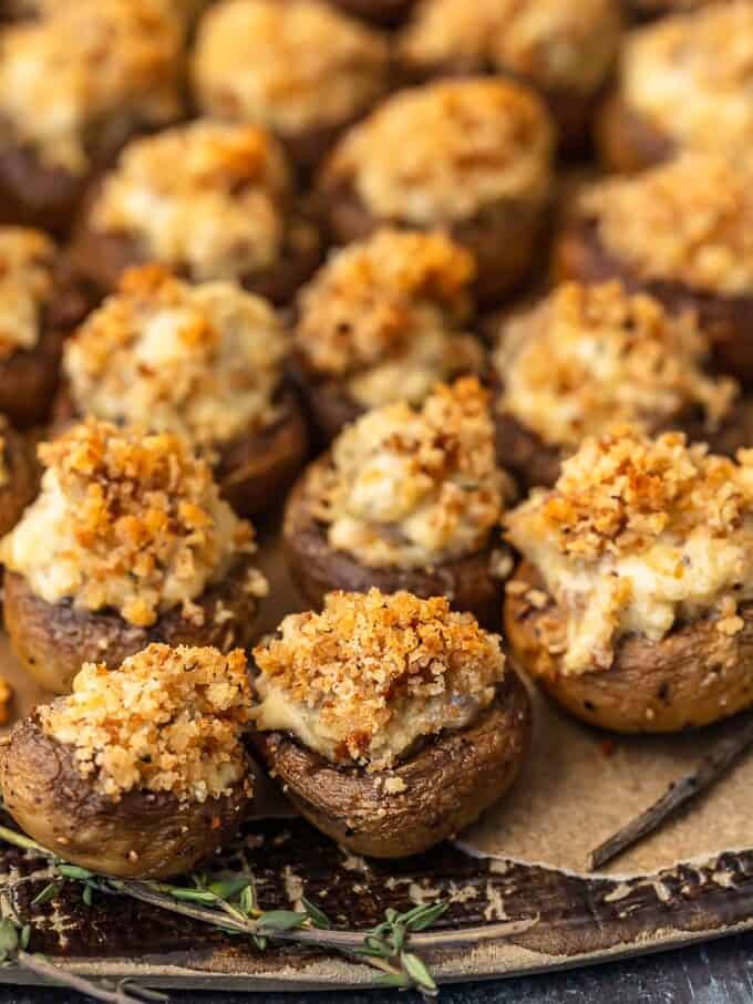 mushroom caps stuffed with cheese and sausage filling, and topped with bread crumbs