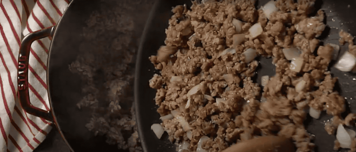 adding ground pork to the ground chuck.
