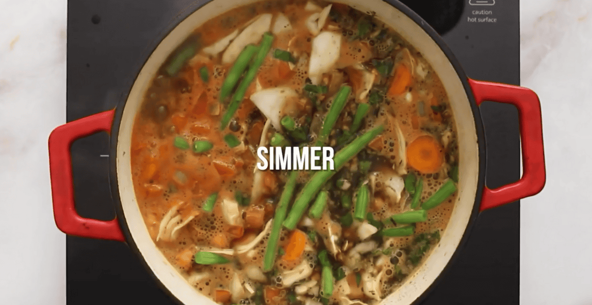 Simmering the ingredients for the cabbage soup. 