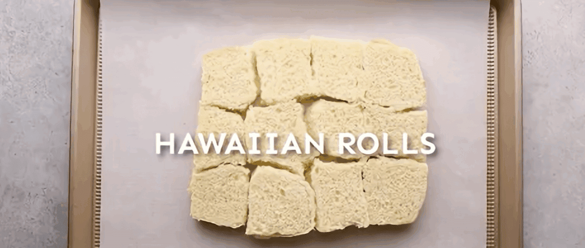 Bottom half of the slider rolls on a lined baking sheet.