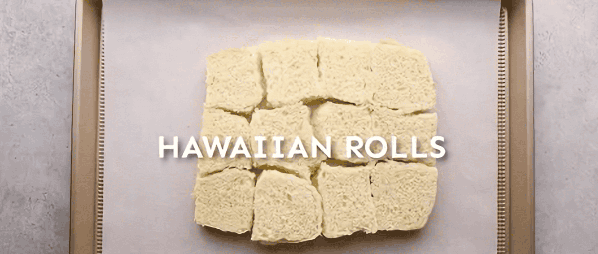 Bottom half of the slider rolls on a lined baking sheet.