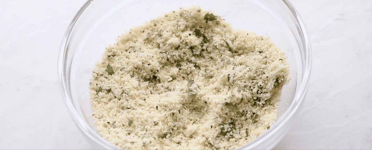 Mixing the Parmesan herb coating.