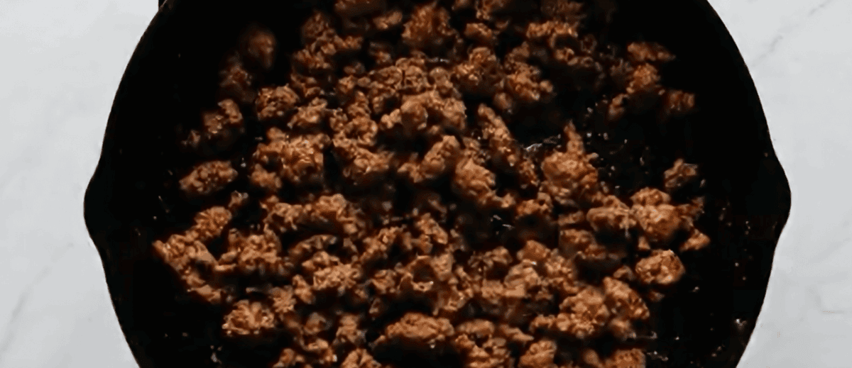 Browning the ground beef.