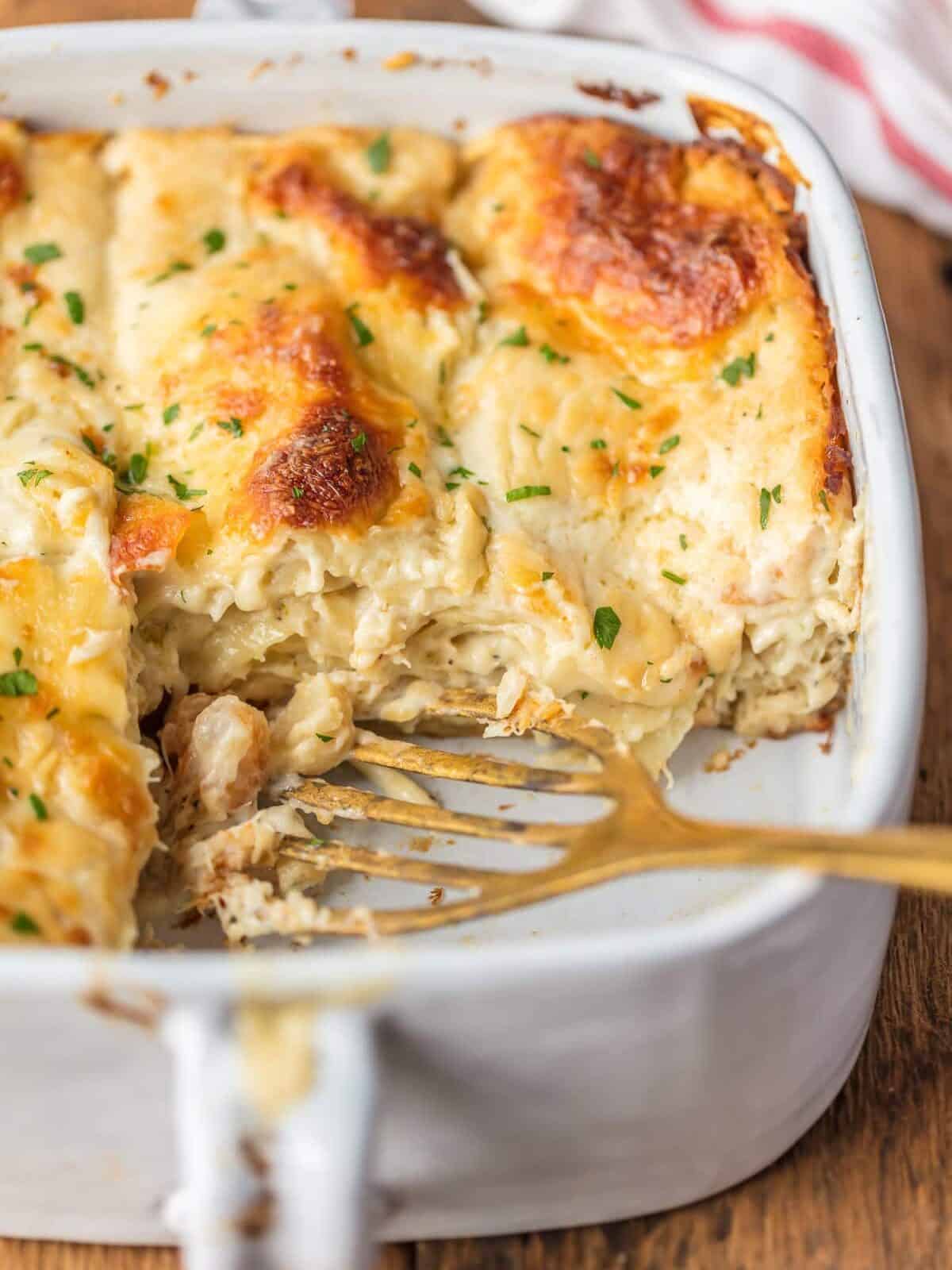 SEAFOOD LASAGNA is full of flavor, beautiful, and fool-proof. Layers of noodles, cheese, crab, shrimp, and more! This seafood lasagna recipe is so delicious! Best Seafood recipe, seafood lasagna