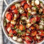 Chopped Caprese Salad is the perfect easy side dish for any BBQ! Simple, delicious, and healthy! Tomato, Mozzarella, Basil, and Balsamic Vinegar. A family favorite! This Caprese Salad Recipe (Tomato Mozzarella Salad) is my go-to side dish for everything Summer!