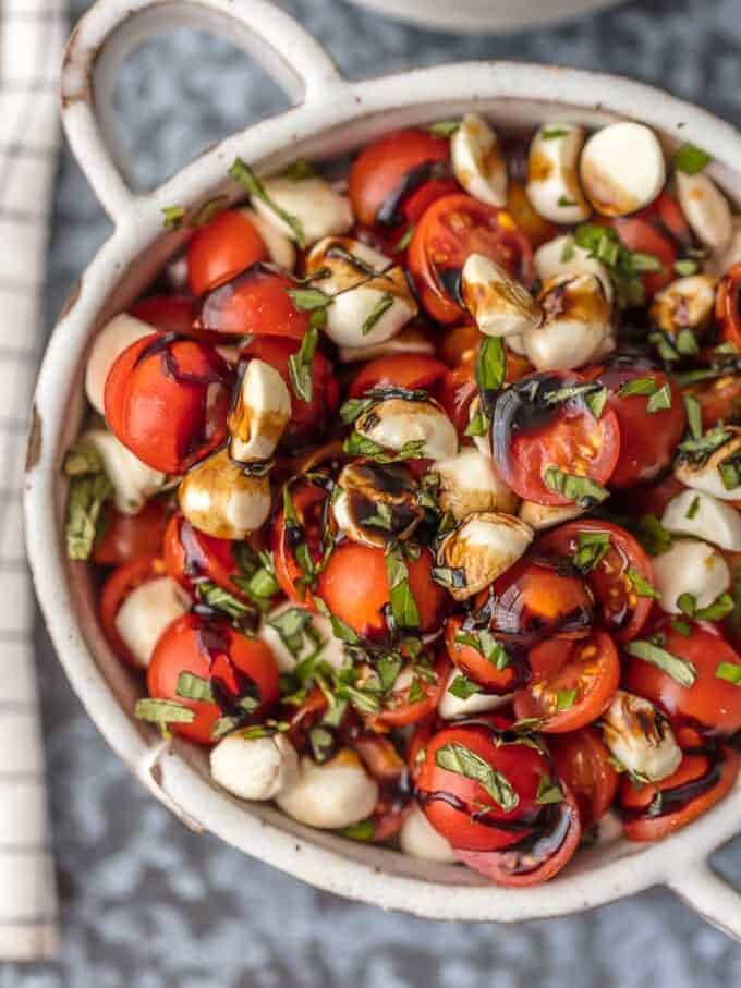 up close picture of caprese salad in a bowl