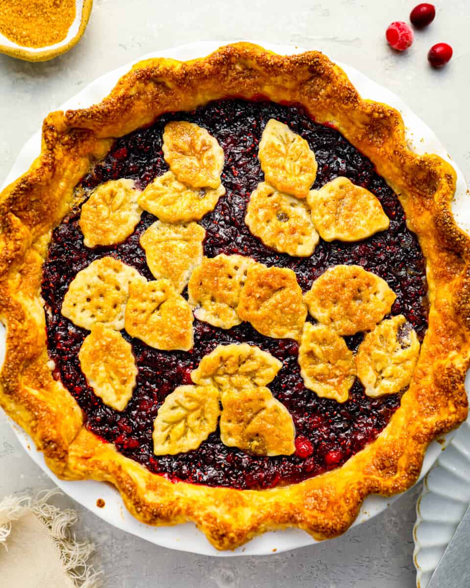 A cranberry orange pie with pie crust pieces on top.