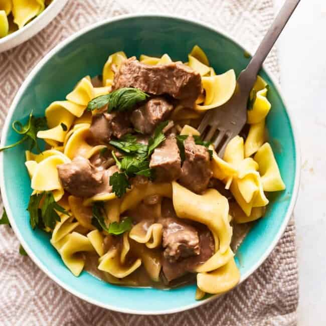 Swedish beef and noodles in a bowl with a fork.