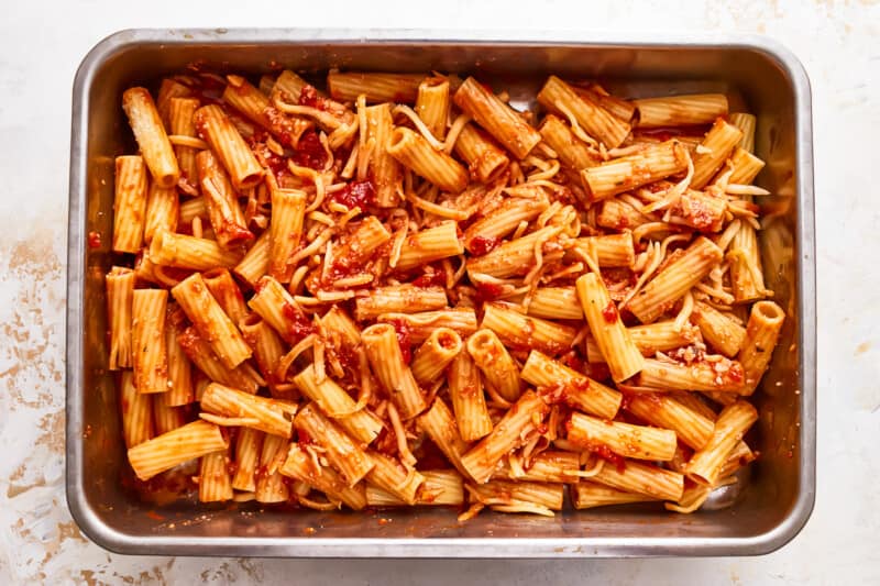 Penne pasta with tomato sauce in a pan.