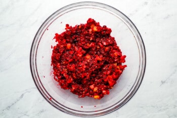 Cranberry compote in a glass bowl.