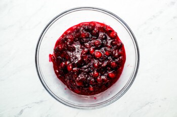 Cranberry sauce in a glass bowl.