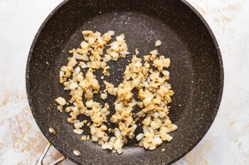 Fried onions in a frying pan.