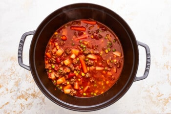 A pot of stew with meat and vegetables in it.