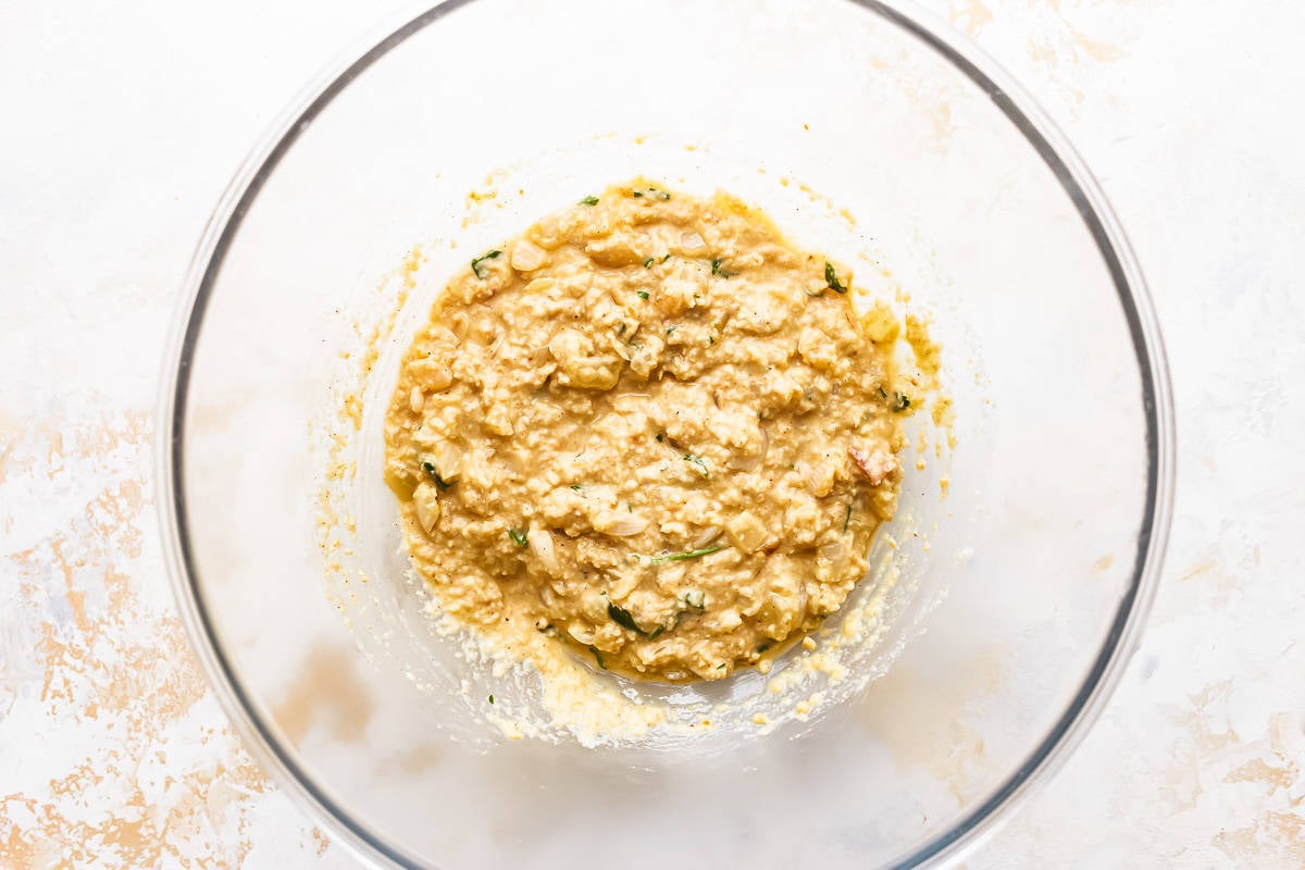 A bowl filled with the breadcrumb mixture.