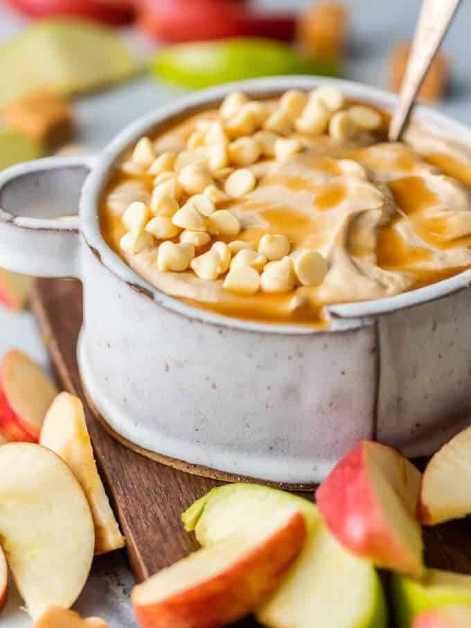 creamy caramel apple dip in a bowl with apples
