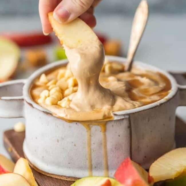 Every Fall party needs SKINNY CARAMEL APPLE DIP! This lightened up version of our favorite sweet snack is gone in minutes every time.