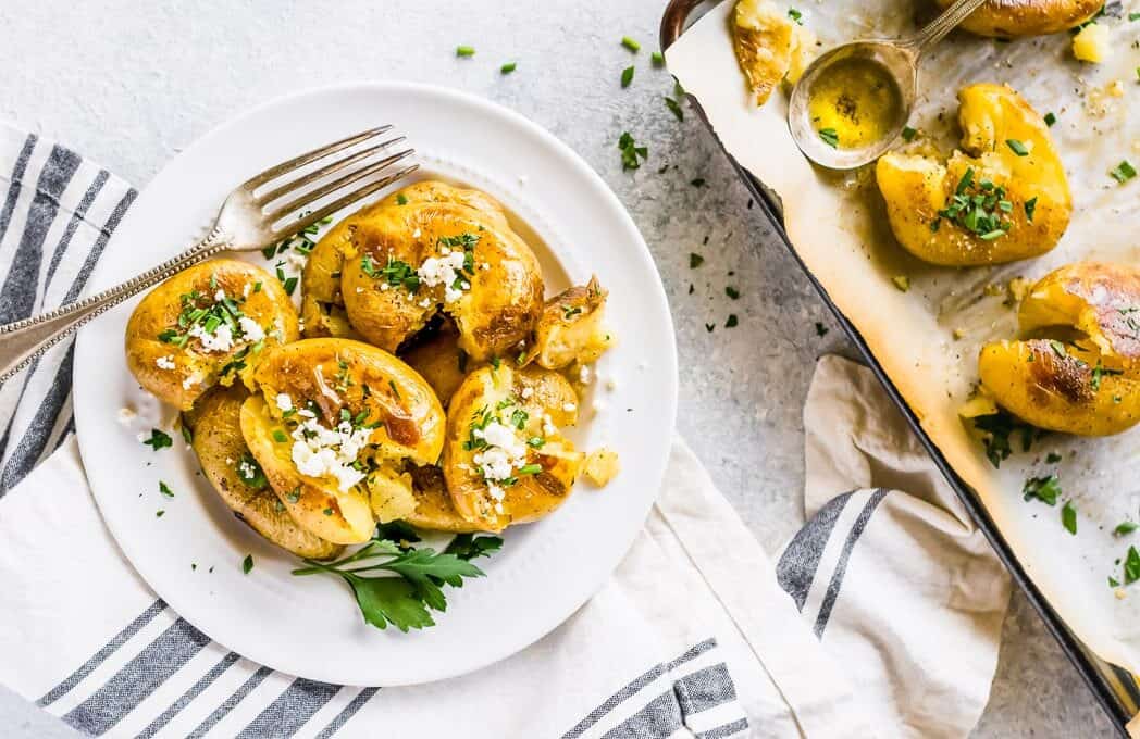 smashed potatoes on a plate