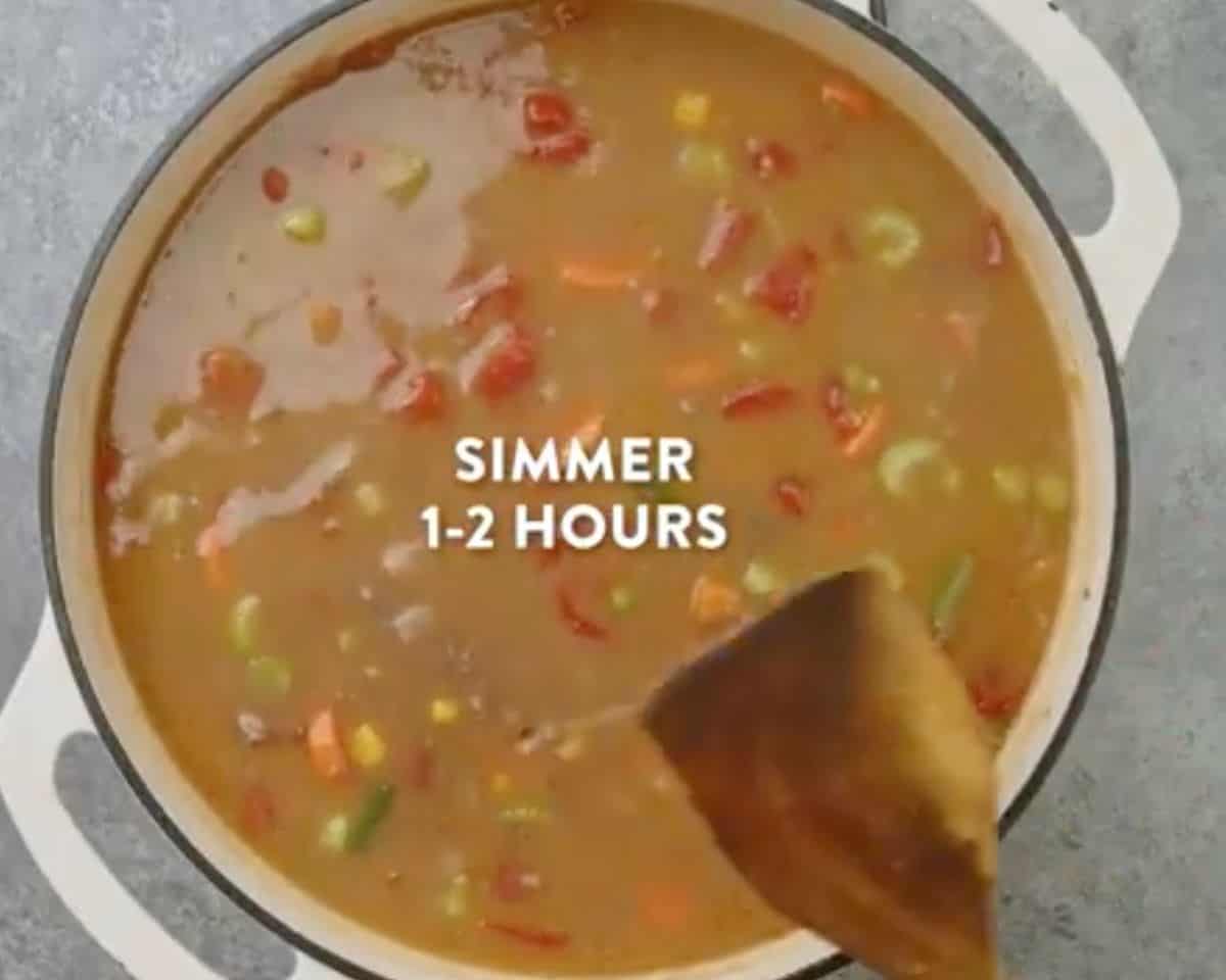 Steak soup simmering in a Dutch oven for 1–2 hours to develop flavor - 12
