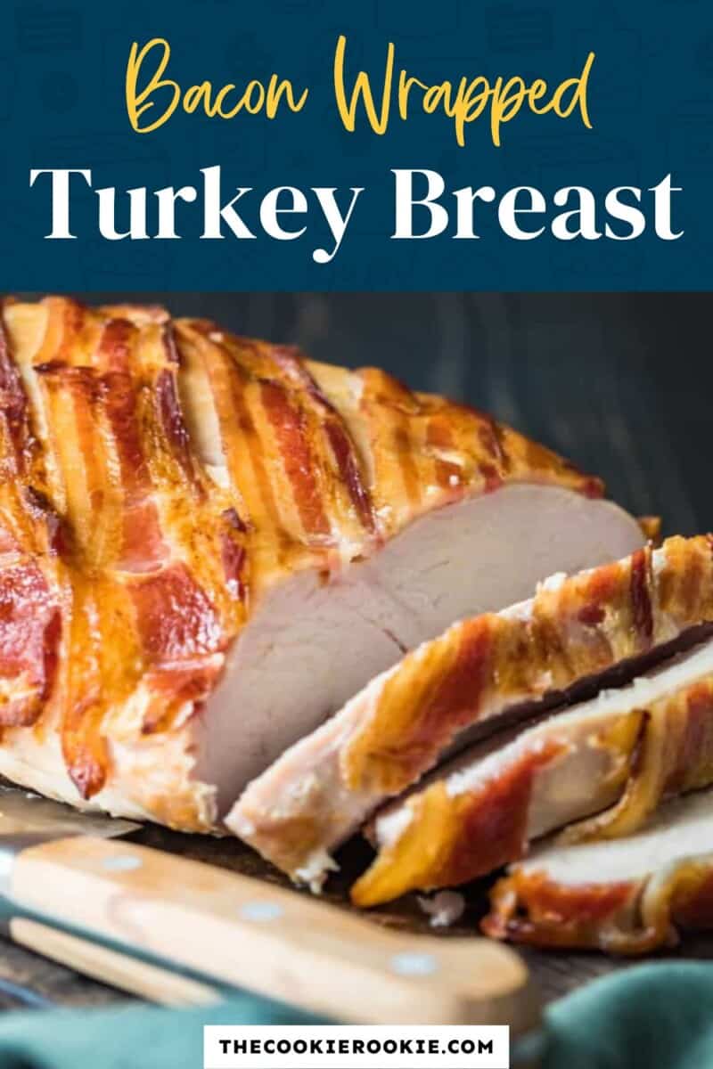 Bacon wrapped turkey breast on a cutting board.