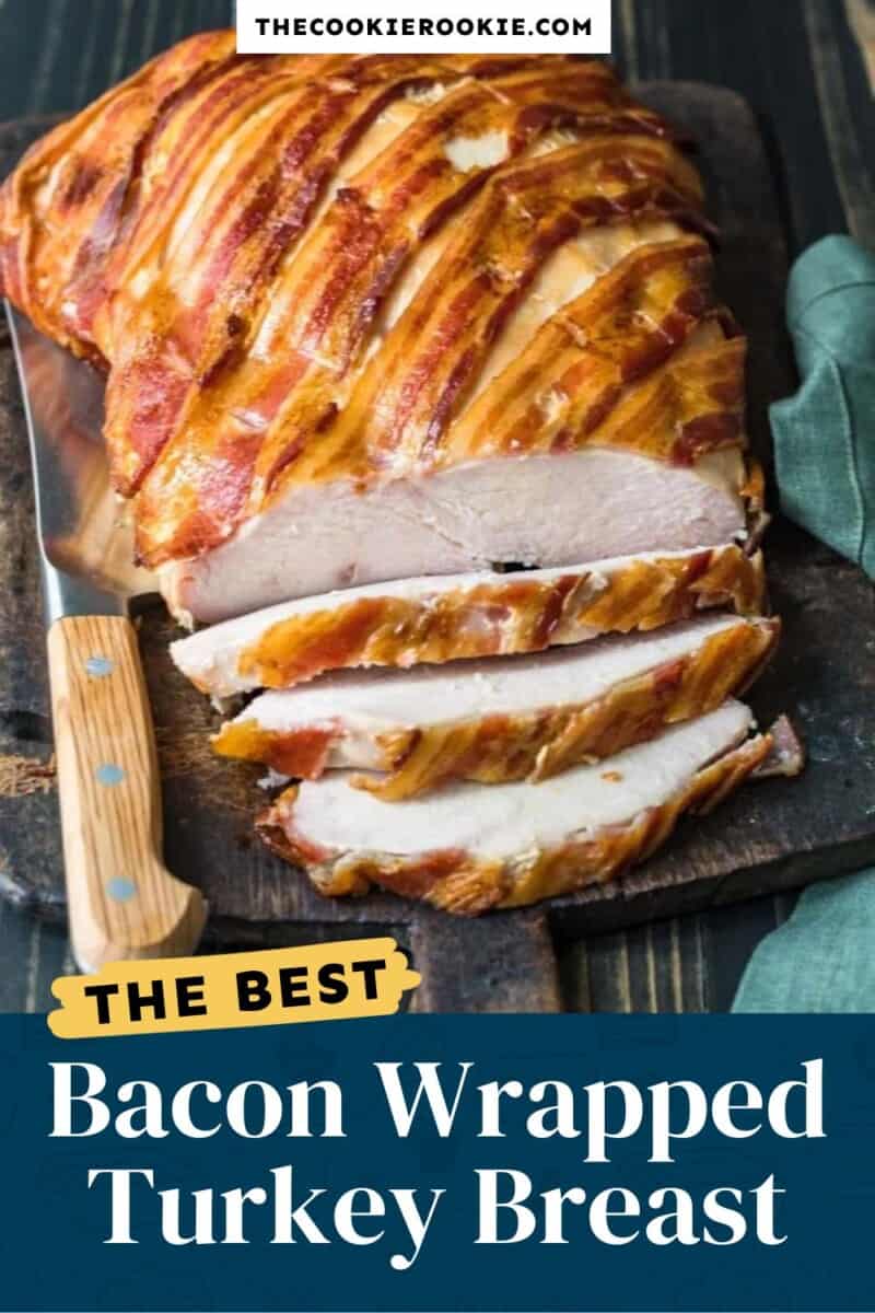 Bacon wrapped turkey breast on a cutting board.