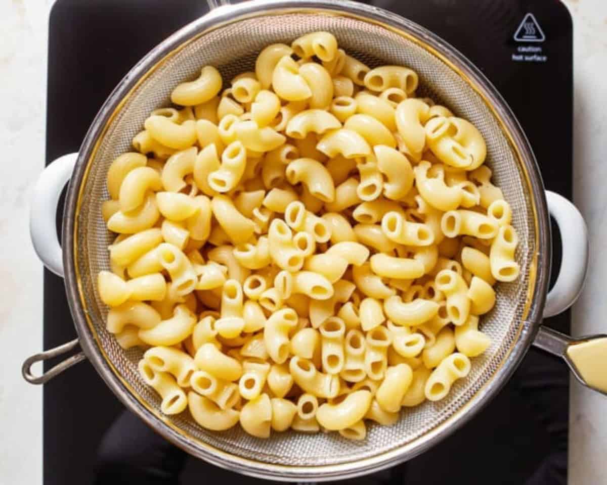 Macaroni in a colander.