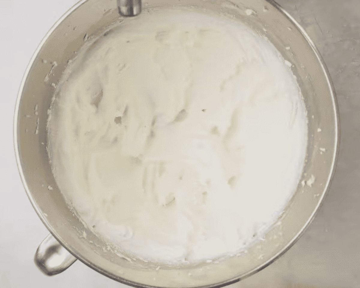 Creamed butter and sugar in a stainless steel bowl.