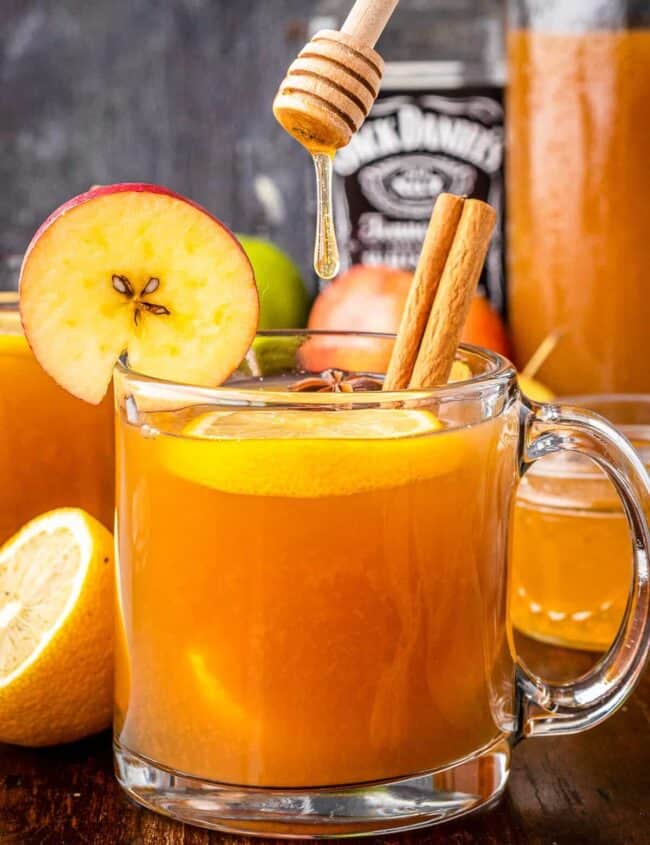 clear glass mug with apple cider hot toddy