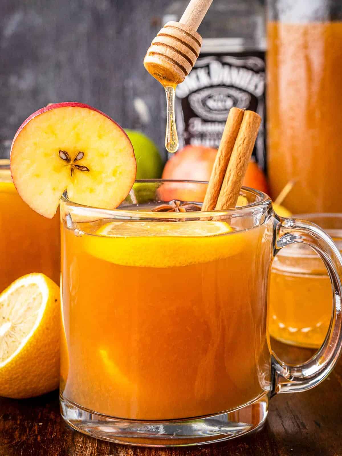 clear glass mug with apple cider hot toddy