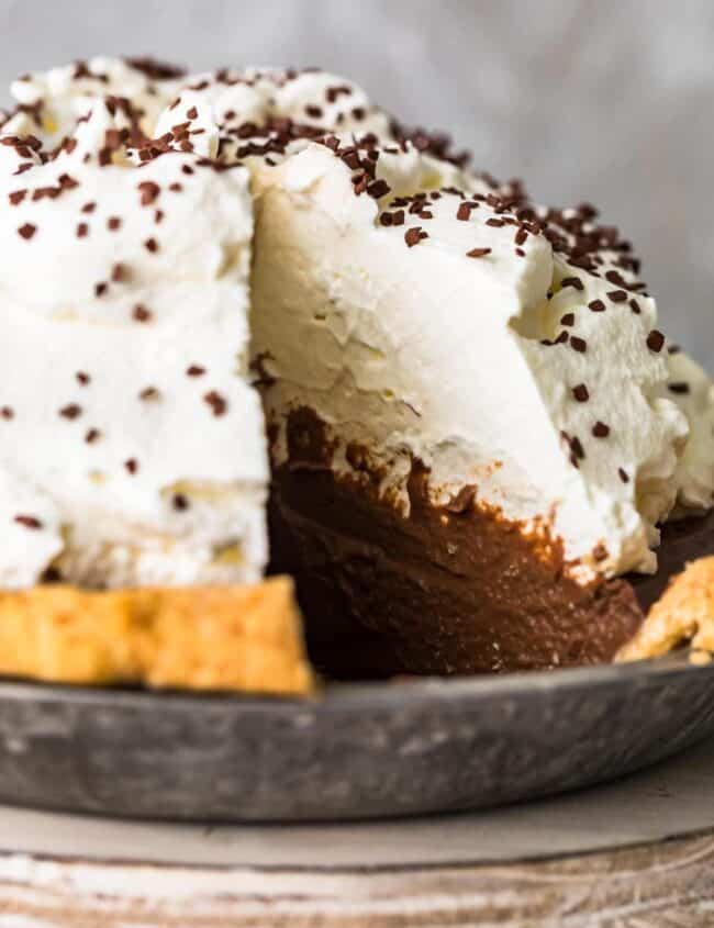 creamy chocolate pie with a ton of whipped cream on top