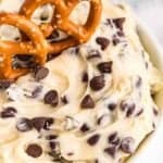 up close image of chocolate chip cookie dough dip with pretzels