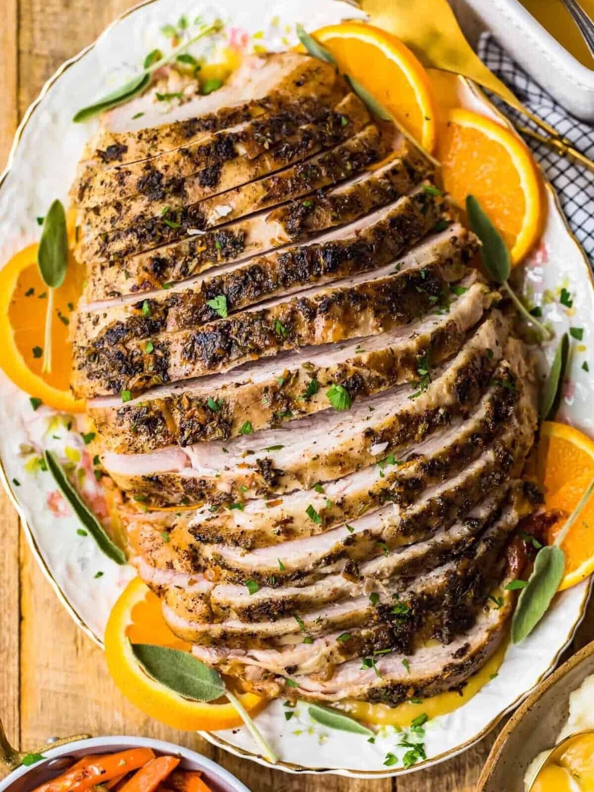 Top shot of sliced turkey breast on a serving plate