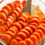 candied sweet potatoes in a glass dish.