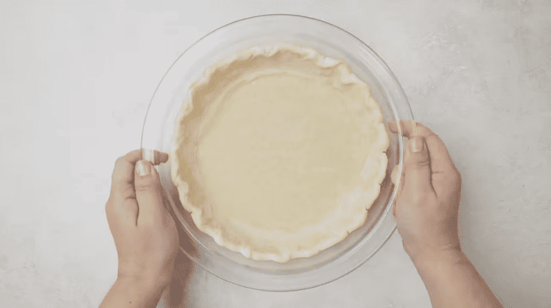 baked pie crust in a glass pie dish.