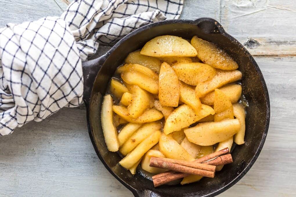 A recipe for fried apples cooked in a skillet with a delightful touch of cinnamon.