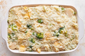 A casserole dish with broccoli and rice.