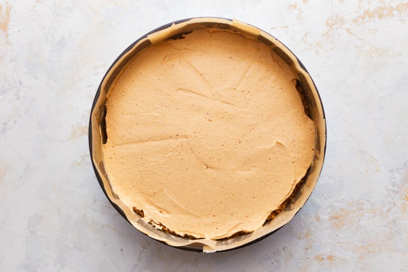 Peanut butter pie in a pan on a table.