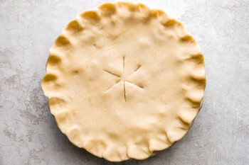 A pie crust with a star in the middle.