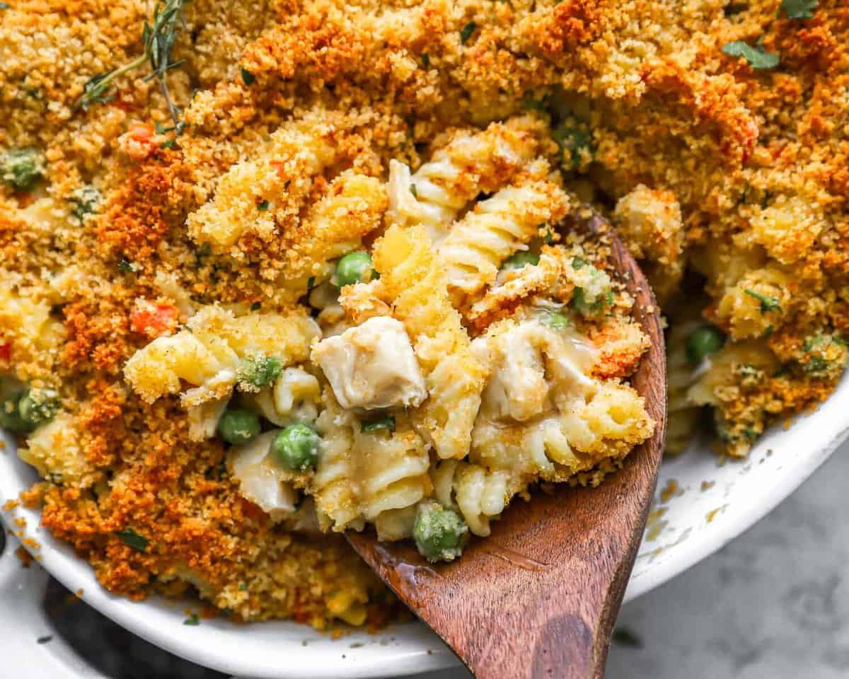 turkey and pasta casserole with a wooden spoon.