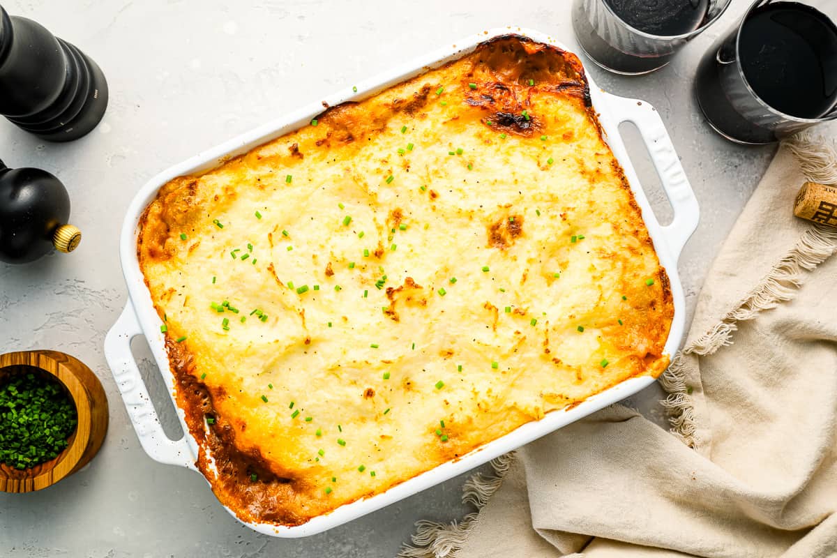 Shepherd's Pie topped with mashed potatoes in a casserole dish.