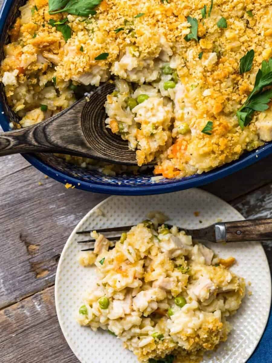 Turkey and rice casserole on a plate with a spoon.