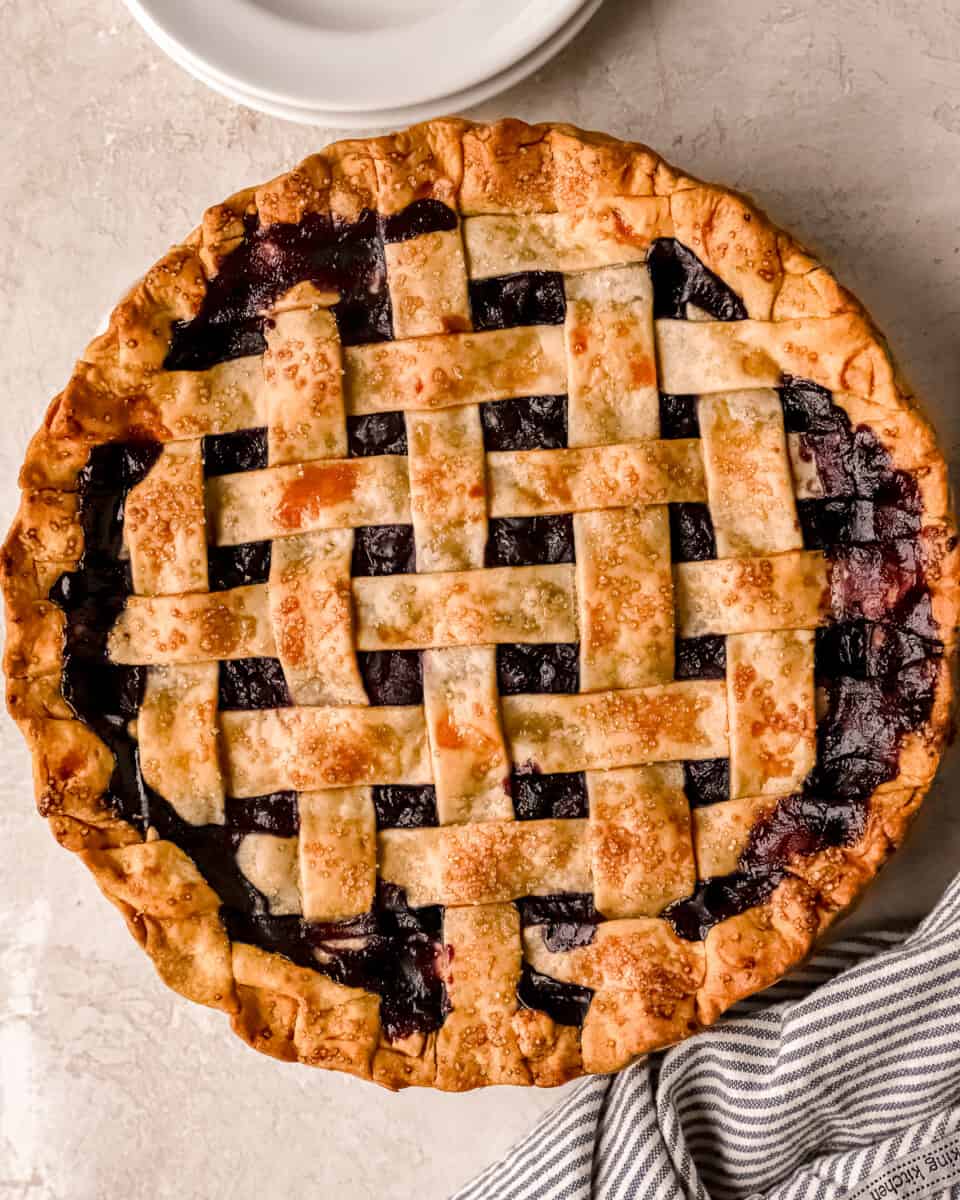 A blueberry pie with a lattice pattern on top.