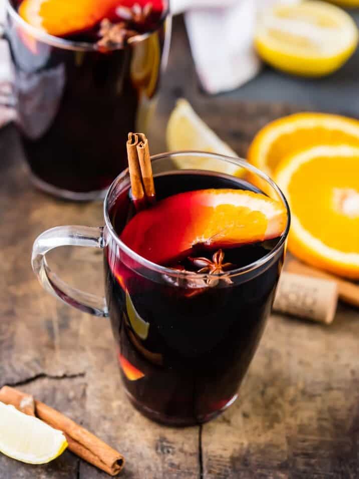 Simple mulled wine recipe, garnished with orange and cinnamon