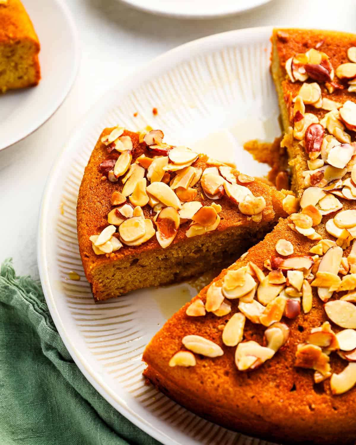 A plate with slices of honey cake on it.