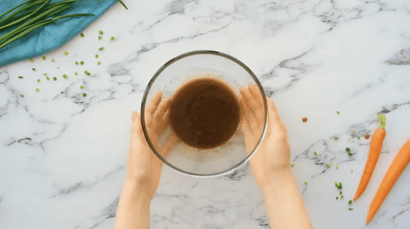 spiced melted butter in a glass bowl.