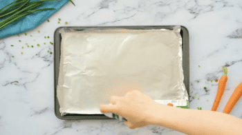 spraying a foil-lined baking sheet with nonstick spray.