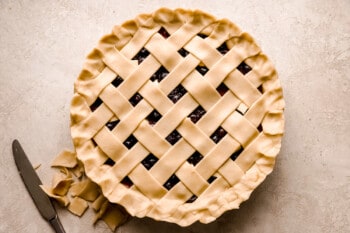 A blackberry pie with a lattice pattern on top.