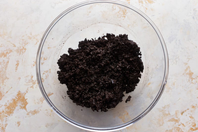 Crumbled oreo cookies in as mixing bowl.