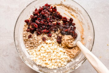 The ingredients for cranberry granola in a bowl.