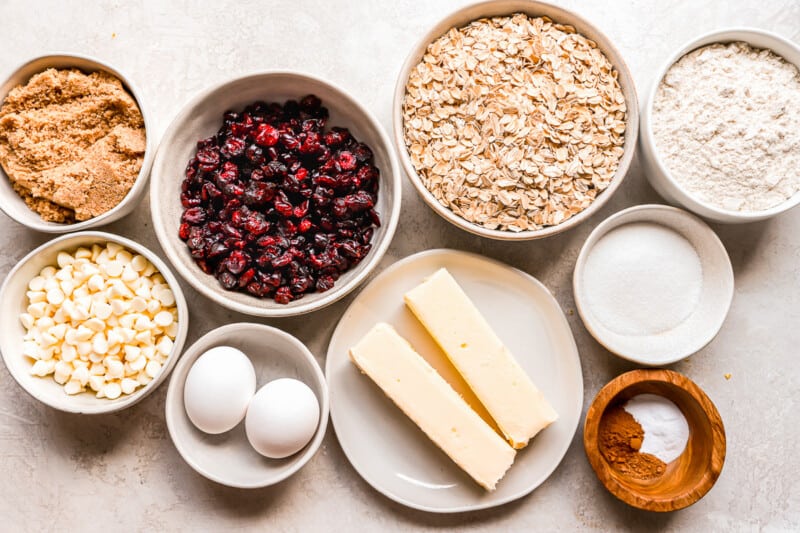 Cranberry oatmeal recipe ingredients on a white background.