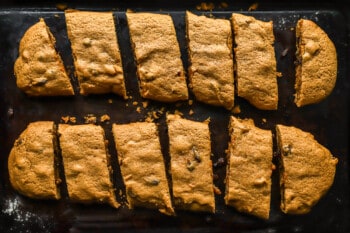 A baking sheet with sliced cookies on it.